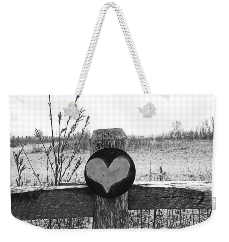 Black Weekender Tote Bag featuring the photograph Black and White Fence by Toby McGuire
