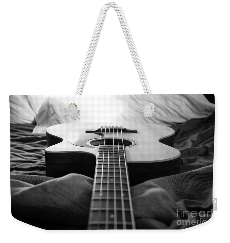 Photography Weekender Tote Bag featuring the photograph Black and White Guitar by MGL Meiklejohn Graphics Licensing