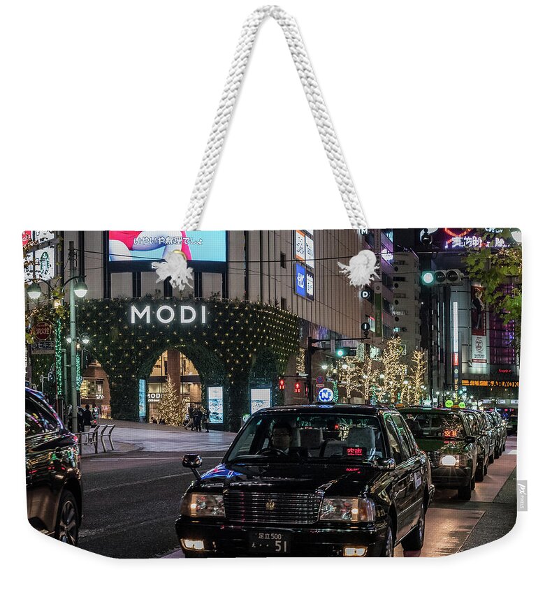 People Weekender Tote Bag featuring the photograph Black Taxi in Tokyo, Japan by Perry Rodriguez