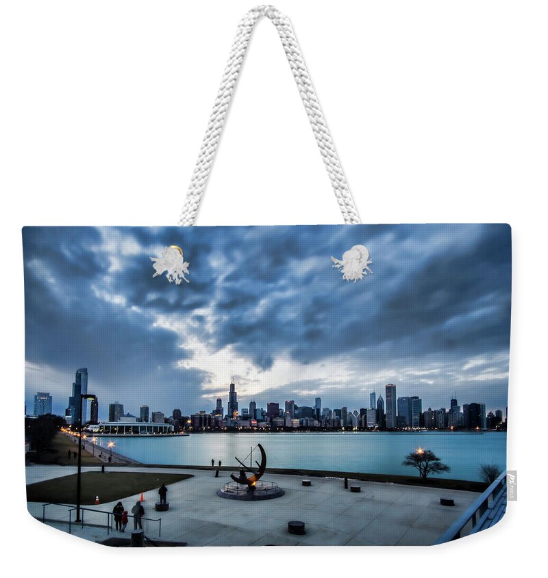 Chicago Weekender Tote Bag featuring the photograph Blue clouds and Chicago Skyline by Sven Brogren