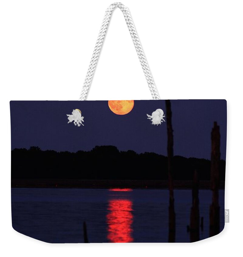 Blue Moon Weekender Tote Bag featuring the photograph Blue Moon by Raymond Salani III