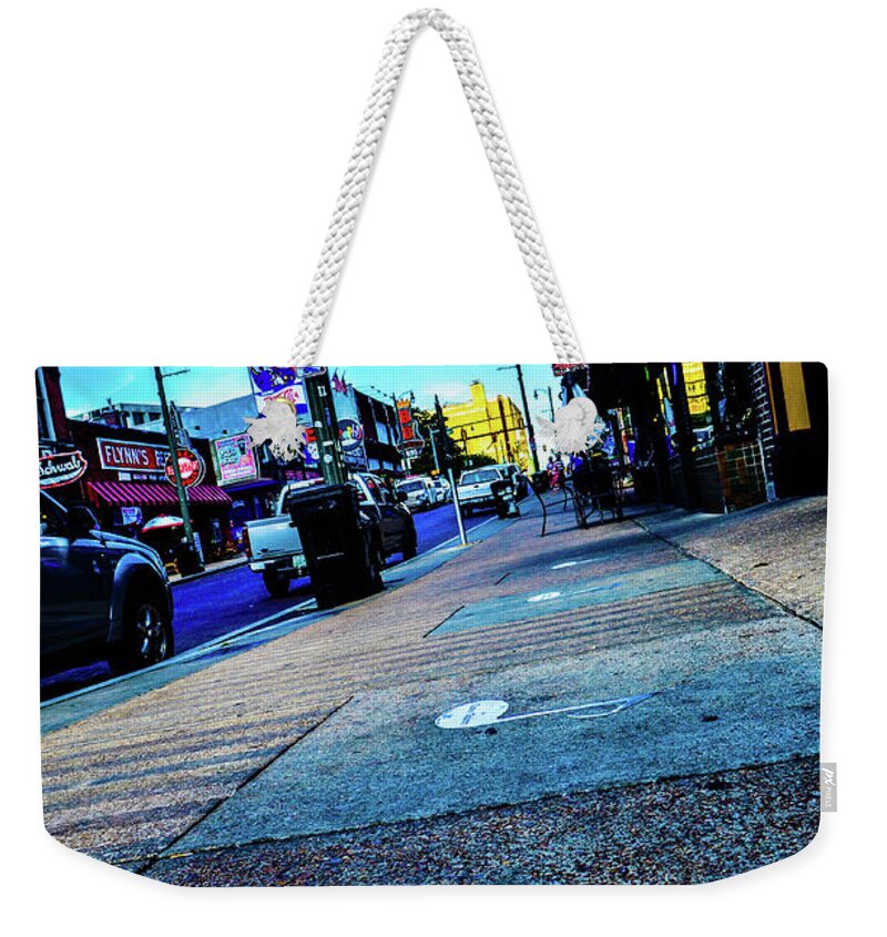 Memphis Weekender Tote Bag featuring the photograph Blue Notes on Beale by D Justin Johns