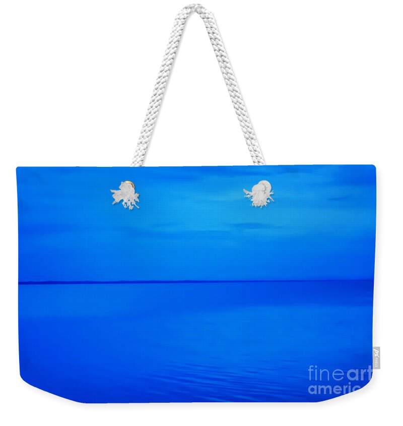 Blue Ocean Twilight Weekender Tote Bag featuring the photograph Blue Ocean Twilight by Randy Steele