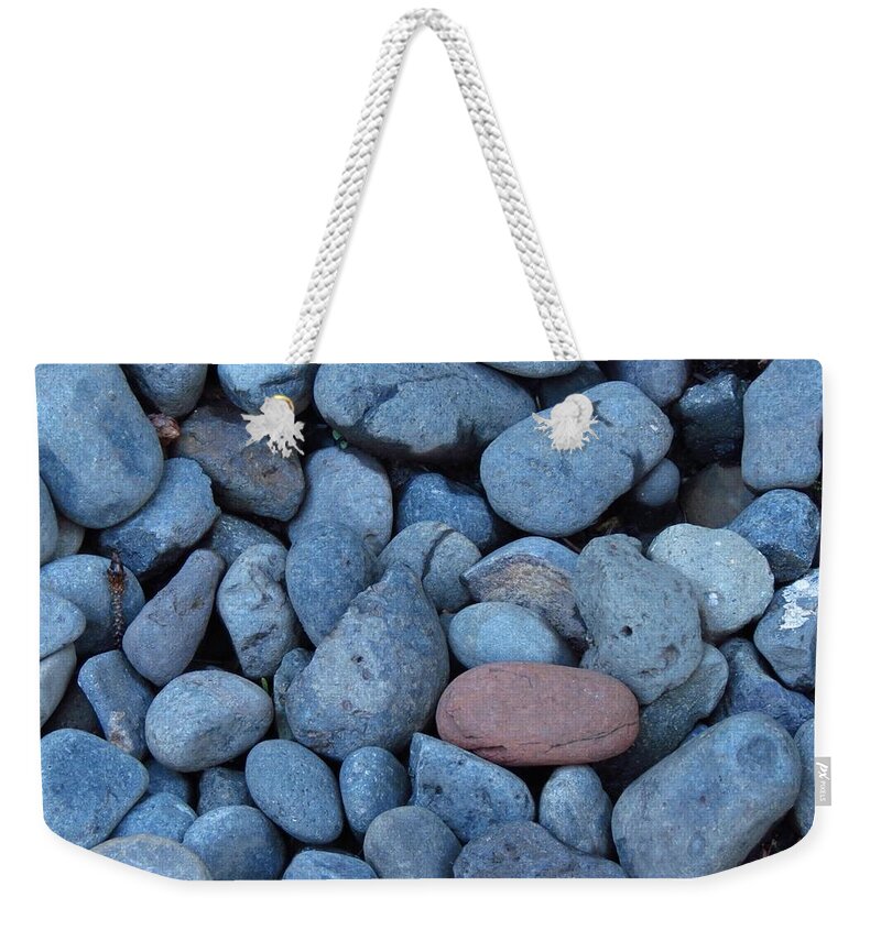 River Stones Weekender Tote Bag featuring the photograph Blue Stones and One Red by Anita Adams