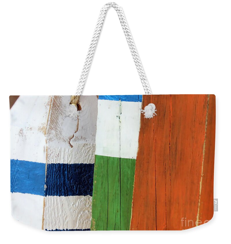 Buoys Weekender Tote Bag featuring the photograph Blue White Green Orange by Janice Drew