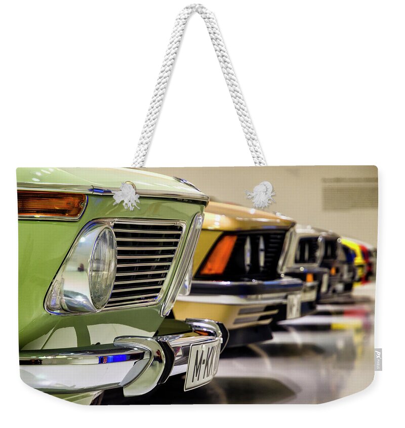 Bmw Weekender Tote Bag featuring the photograph BMW Evolution by Pablo Lopez