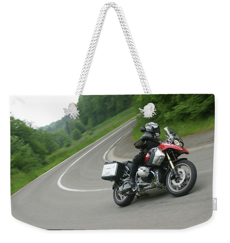 Bmw Weekender Tote Bag featuring the photograph BMW R 1200 GS cornering by Erik Tanghe