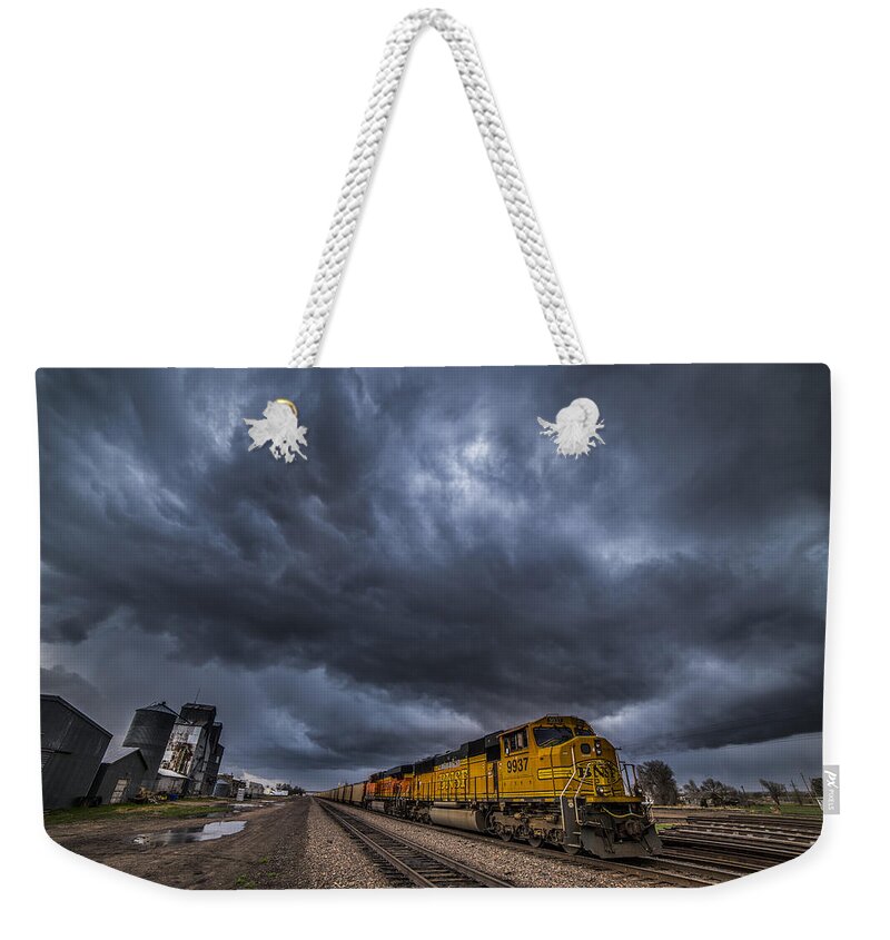 Colorado Weekender Tote Bag featuring the photograph BNSF Storm by Darren White