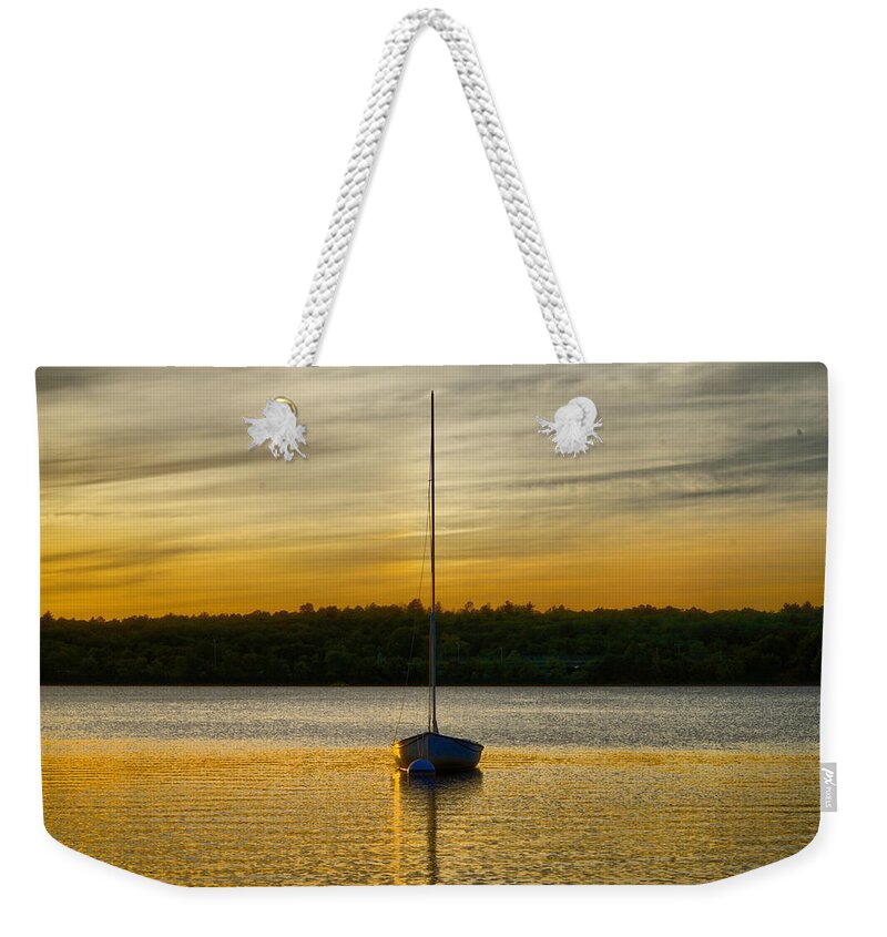 Sunset Weekender Tote Bag featuring the photograph Boat in the Gold Lake by Lilia S