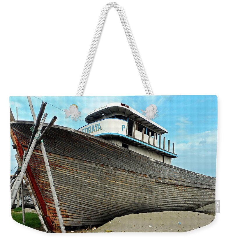 Manta Weekender Tote Bag featuring the photograph Boat Yard 2 by Ron Kandt