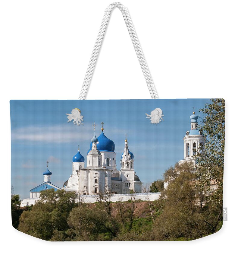 Monastery Weekender Tote Bag featuring the photograph Bogolyubov monastery by Sergei Dolgov