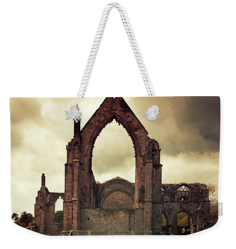 Building Weekender Tote Bag featuring the photograph Bolton Abbey at sunset by Jaroslaw Blaminsky