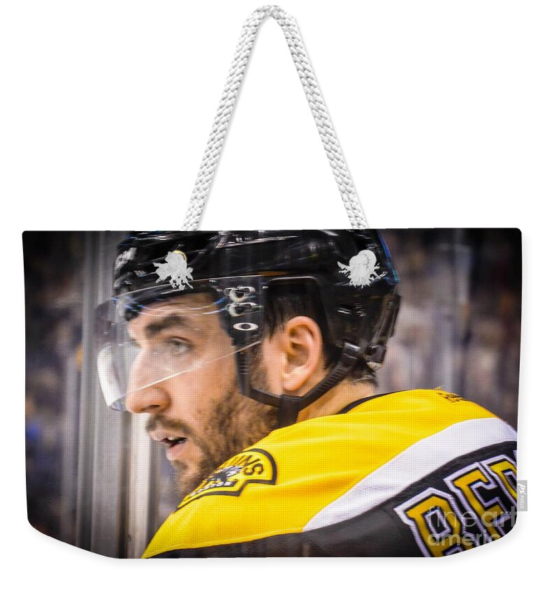 Boston Weekender Tote Bag featuring the photograph Boston Bruin Patrice Bergeron by Lisa Kilby