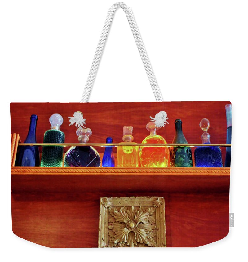 Liquid Weekender Tote Bag featuring the photograph Bottle Styles by Cynthia Guinn