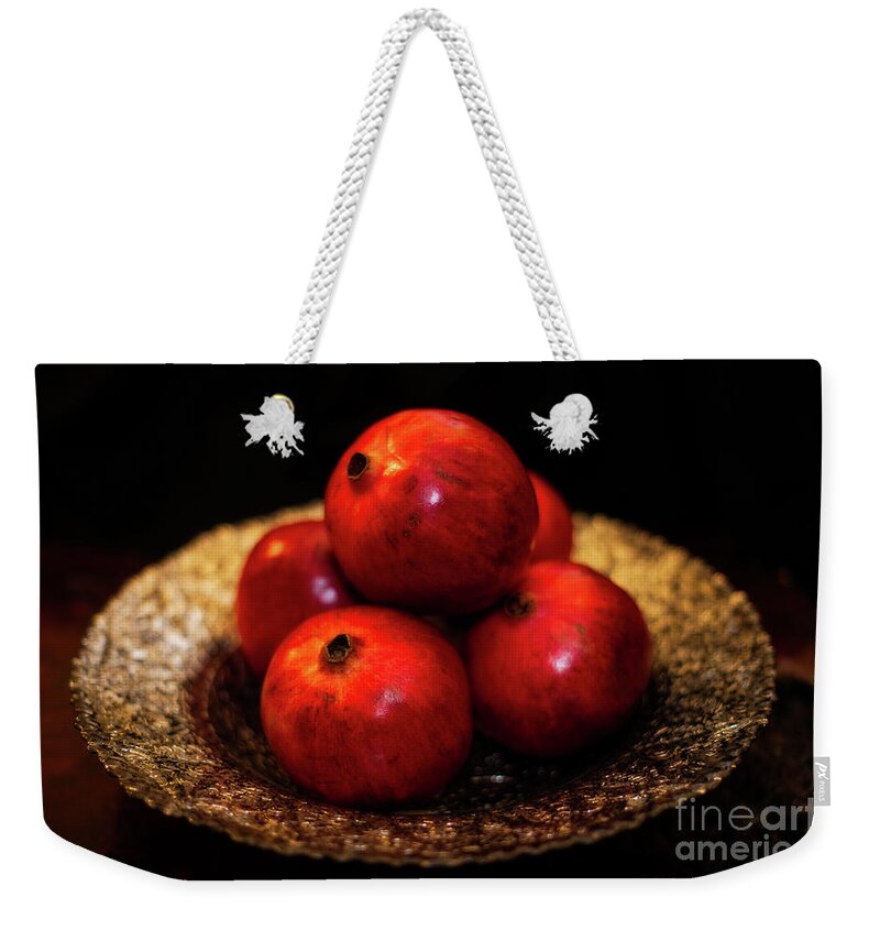 Venetta Archer Weekender Tote Bag featuring the photograph Bowl of Pomegranates by Venetta Archer