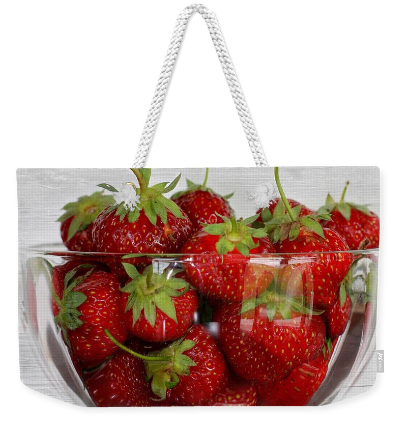 Strawberries Weekender Tote Bag featuring the photograph Bowl of Strawberries by Inspired Arts
