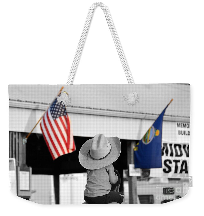 Cowboy Weekender Tote Bag featuring the photograph Boy with Two Flags by Catherine Sherman