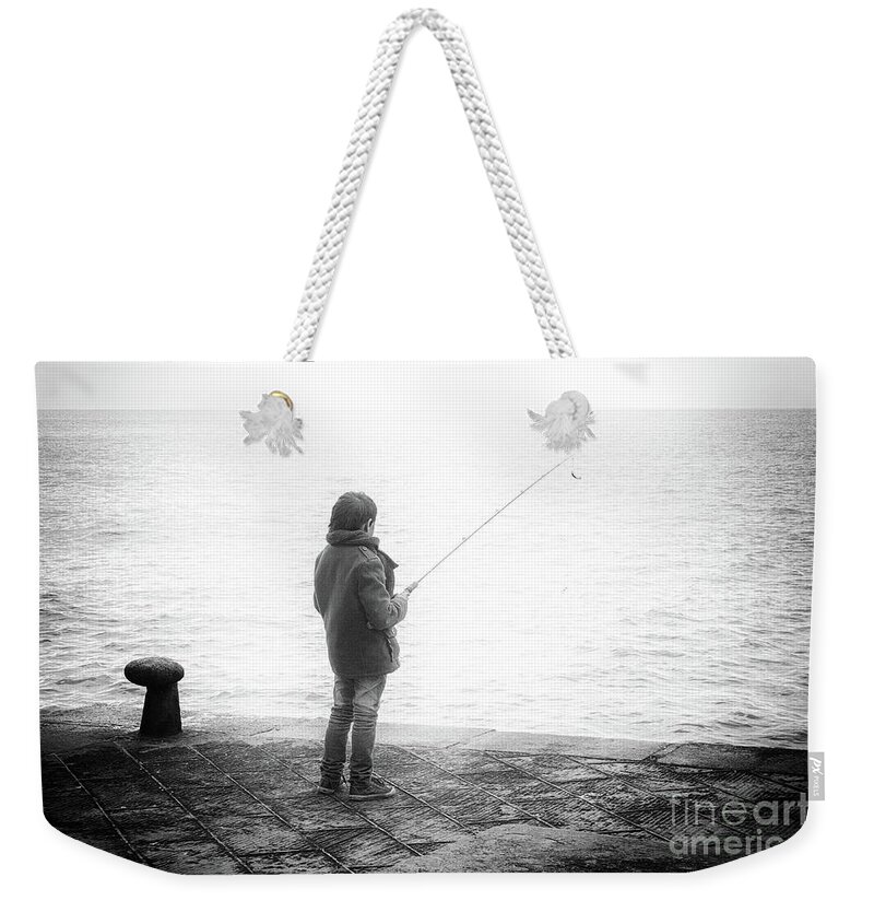 Fishing Weekender Tote Bag featuring the photograph Boyhood by Becqi Sherman