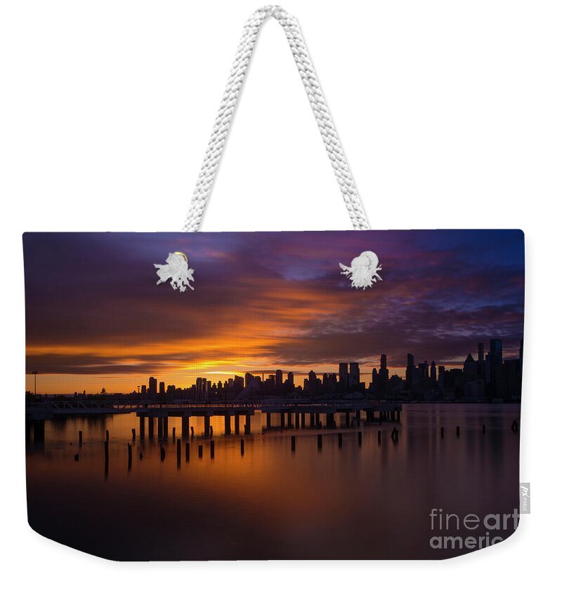 New York City Weekender Tote Bag featuring the photograph Break of Dawn by Marco Crupi