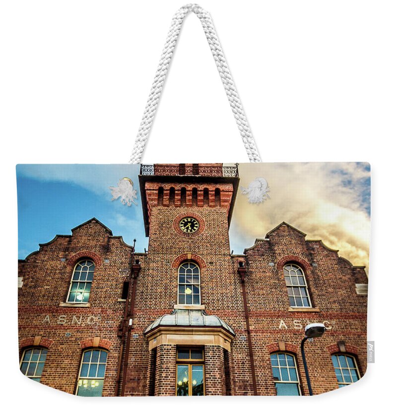Building Weekender Tote Bag featuring the photograph Brick Tower by Perry Webster