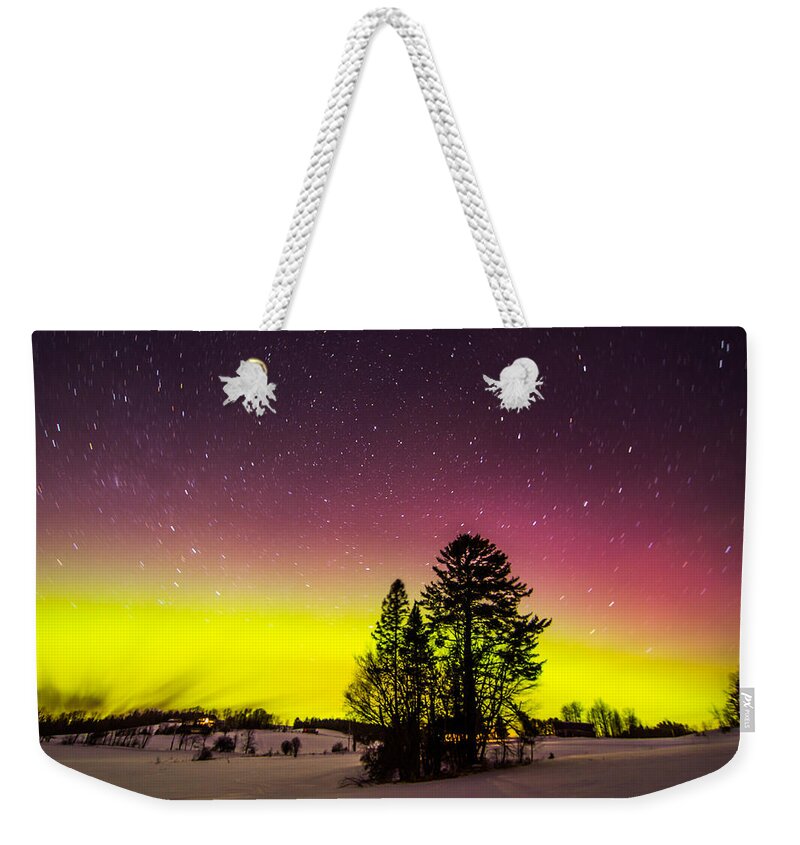 Aurora Weekender Tote Bag featuring the photograph Bright Aurora by Tim Kirchoff