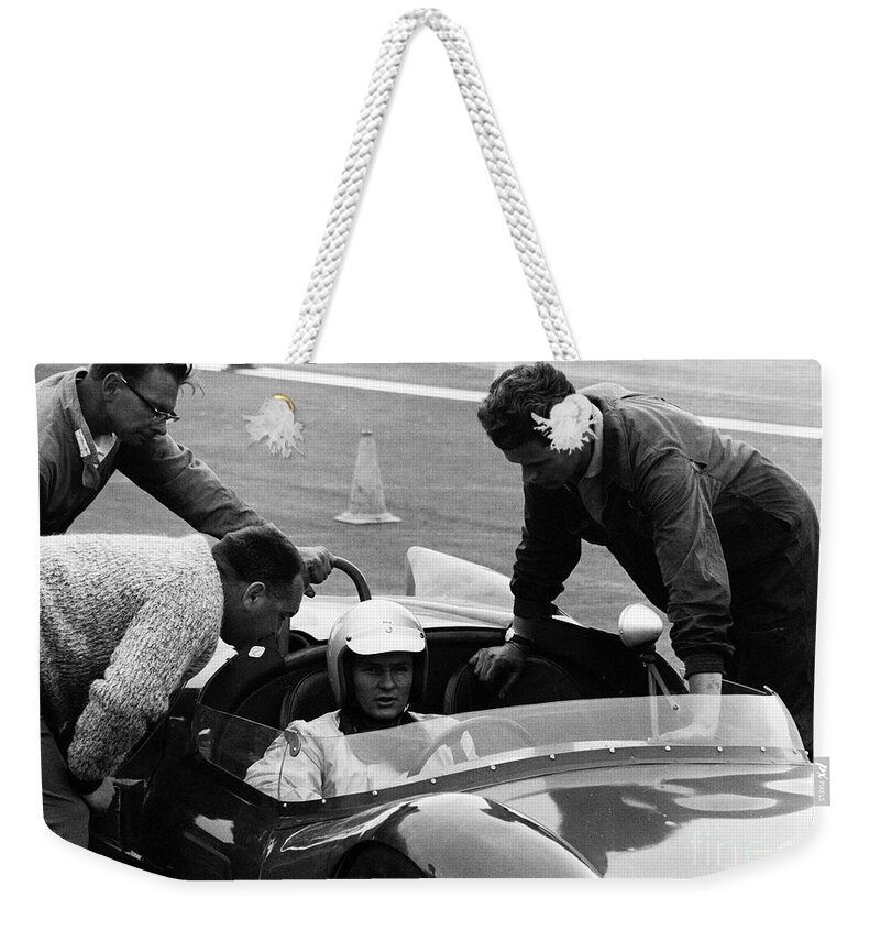 Can-am Weekender Tote Bag featuring the photograph Bruce Mclaren on the pre-grid Laguna Seca by Robert K Blaisdell
