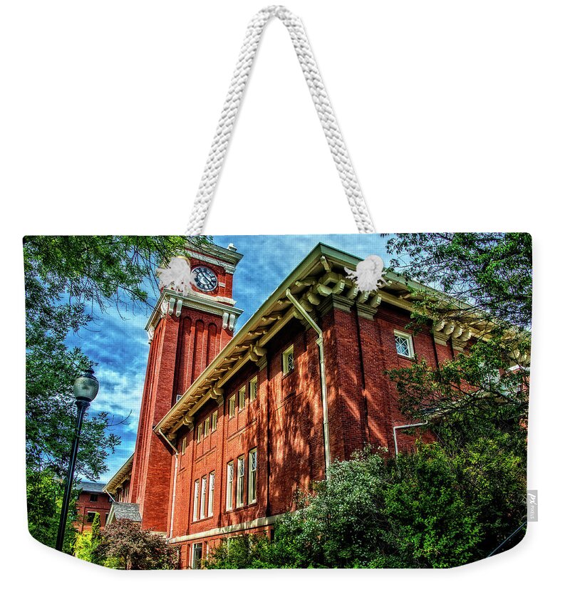 Wsu Weekender Tote Bag featuring the photograph Bryan Hall in the trees by Ed Broberg