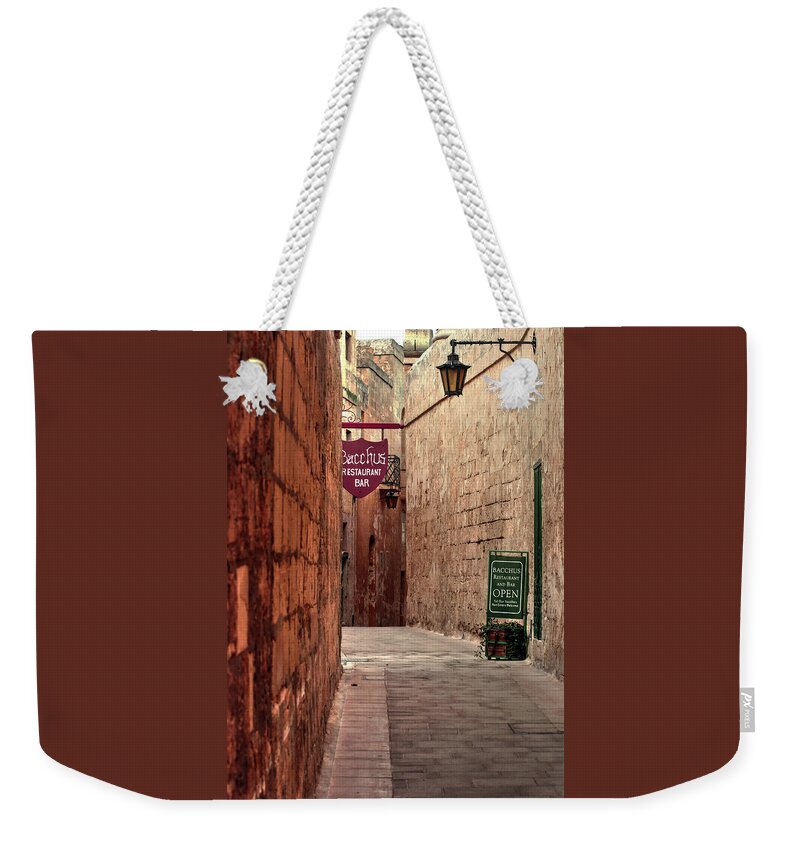 Europe Photographs Weekender Tote Bag featuring the photograph Bacchus restaurant and bar Malta by Tom Prendergast