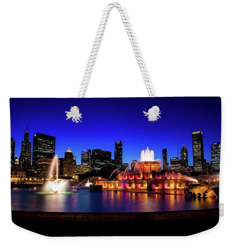 Chicago Weekender Tote Bag featuring the photograph Buckingham Memorial Fountain by Dillon Kalkhurst