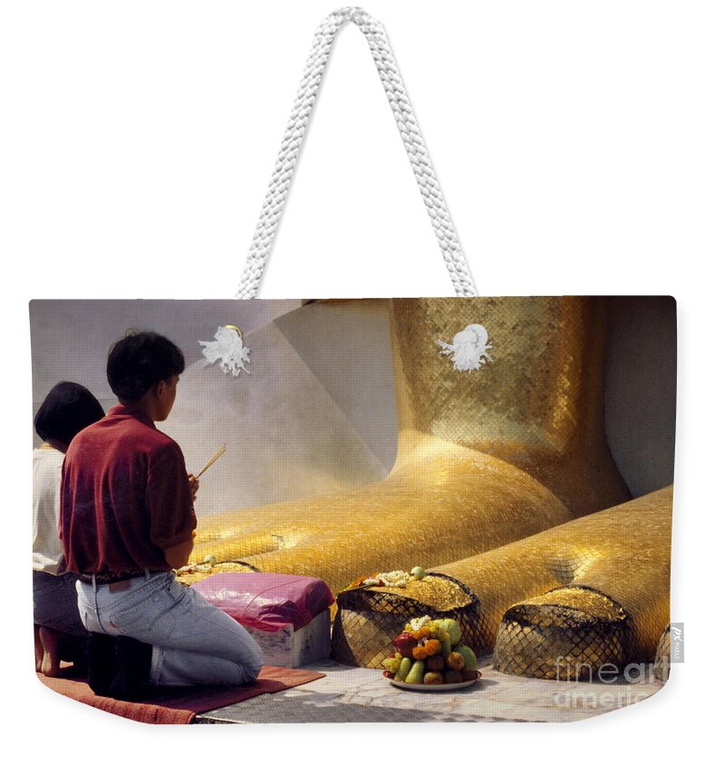 Religion Weekender Tote Bag featuring the photograph Buddhist Thai People Praying by Heiko Koehrer-Wagner