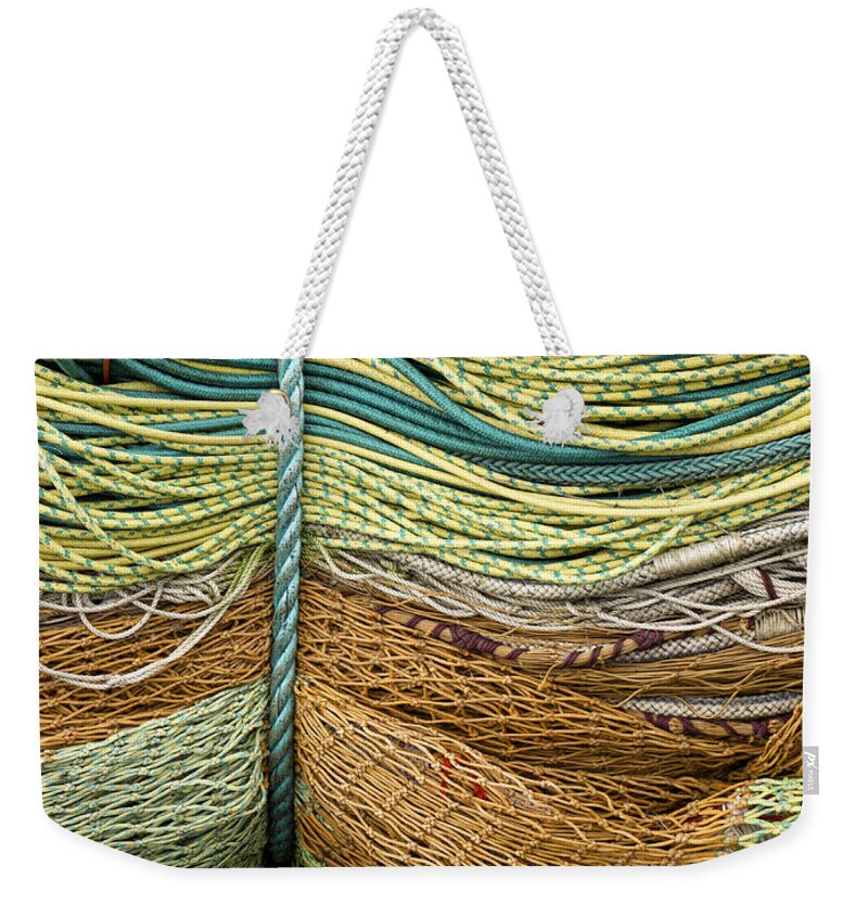Fishing Weekender Tote Bag featuring the photograph Bundle of Fishing Nets and Ropes by Carol Leigh