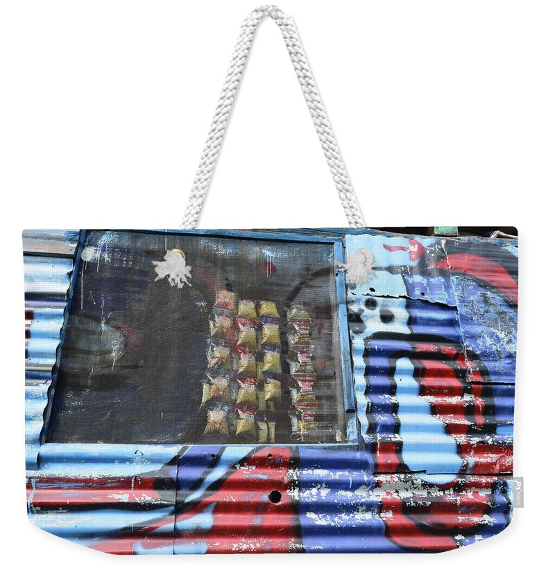 Travel Weekender Tote Bag featuring the photograph By the shop by Sumit Mehndiratta