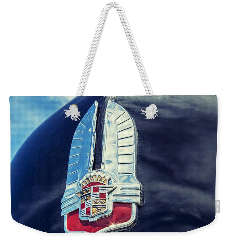 Cadillac Weekender Tote Bag featuring the photograph Cadillac by Caitlyn Grasso