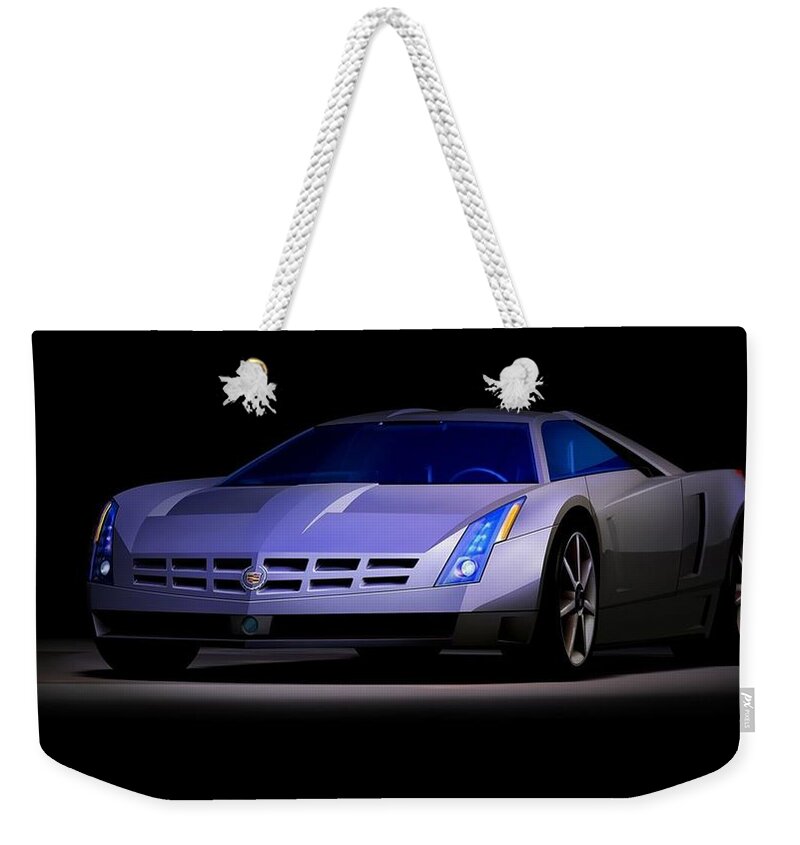 Cadillac Cien Weekender Tote Bag featuring the photograph Cadillac Cien by Mariel Mcmeeking
