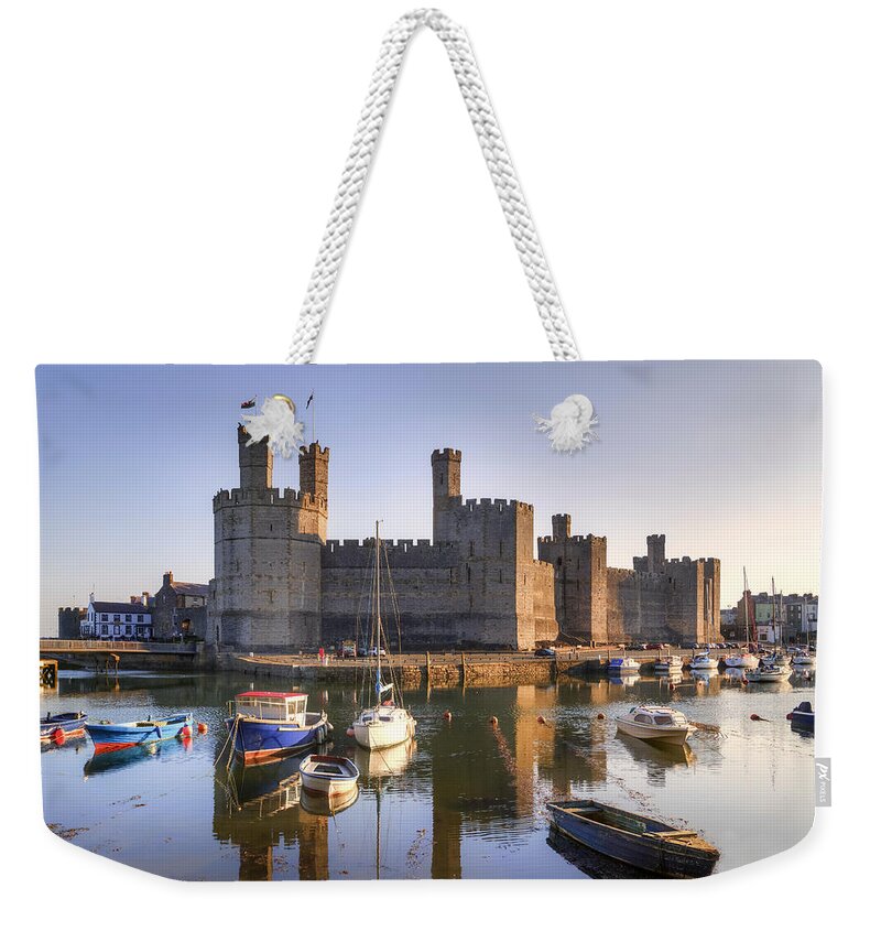 Caernarfon Castle Weekender Tote Bag featuring the photograph Caernafon Castle - Wales by Joana Kruse