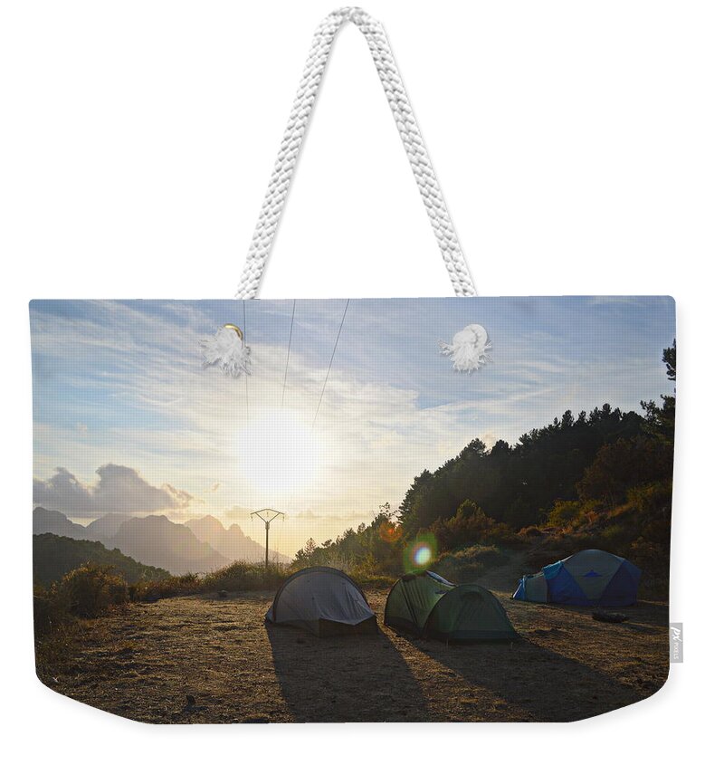 Nikon Weekender Tote Bag featuring the photograph Camping with a view by Jonathan Kerckhaert