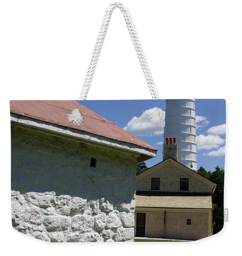 Spike Horn Weekender Tote Bag featuring the photograph Cana Island Lighthouse by Dylan Punke