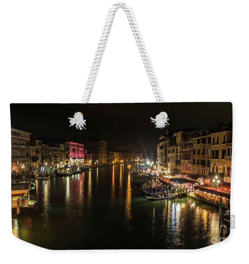 Boat Weekender Tote Bag featuring the photograph Canal in venice by night, in Italy, view from the Rialto bridge by Amanda Mohler