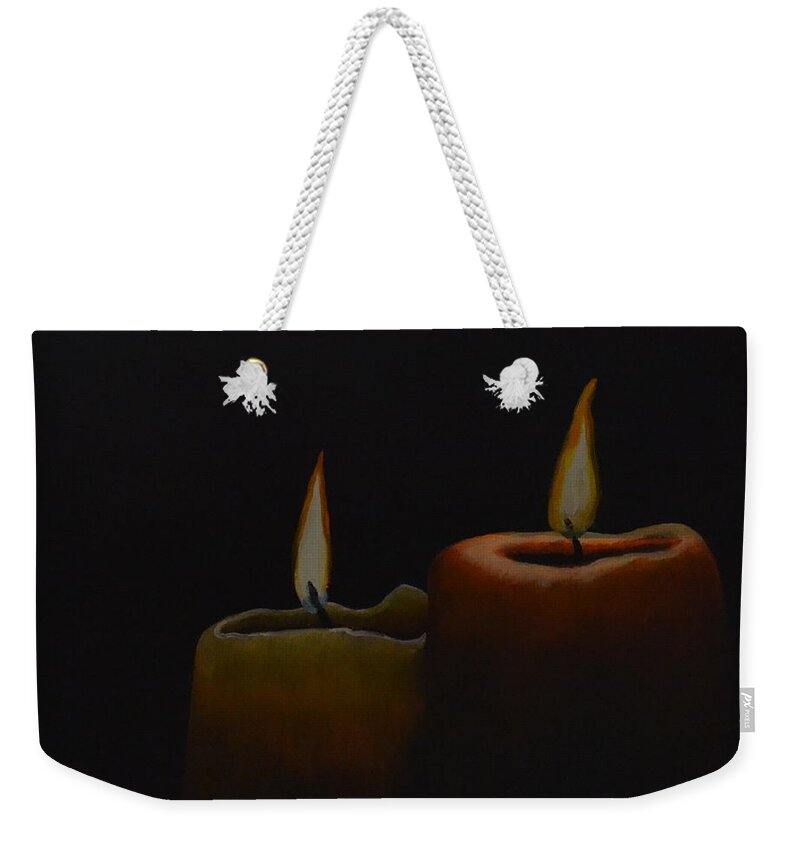 A Painting Of Two Candles With A Burning Flame. The Background Is Black. There Is A Small Yellow Candle Next To A Larger Orange Candle. Weekender Tote Bag featuring the painting Candle Light by Martin Schmidt