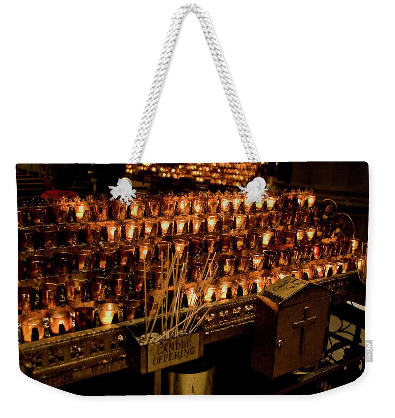 New York City Weekender Tote Bag featuring the photograph Candle Offerings St. Patrick Cathedral by Lorraine Devon Wilke