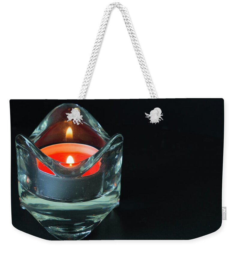 Candle Weekender Tote Bag featuring the photograph Candlelight by Agnes Caruso