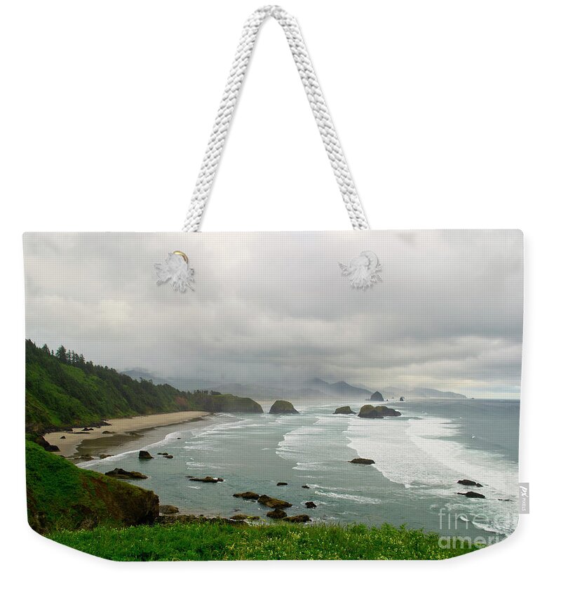 Oregon Coast Weekender Tote Bag featuring the photograph Cannon Coast by Suzette Kallen