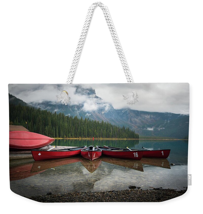 British Columbia Weekender Tote Bag featuring the photograph Canoes at Emerald Lake by James Udall