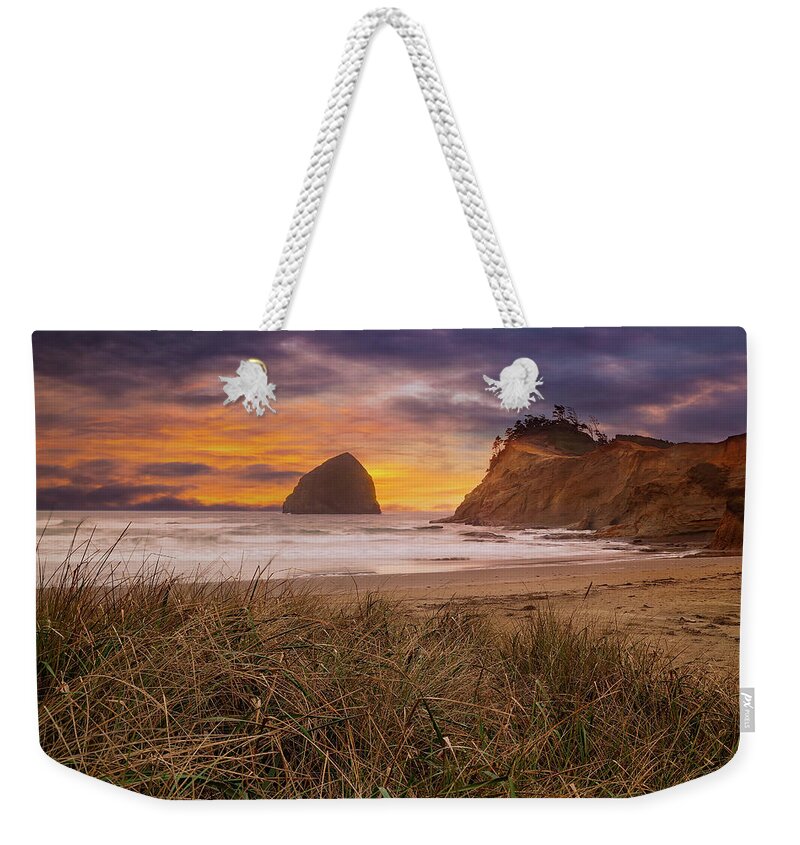 Chief Kiawanda Weekender Tote Bag featuring the photograph Cape Kiwanda in Pacific City Beach at Sunset by David Gn