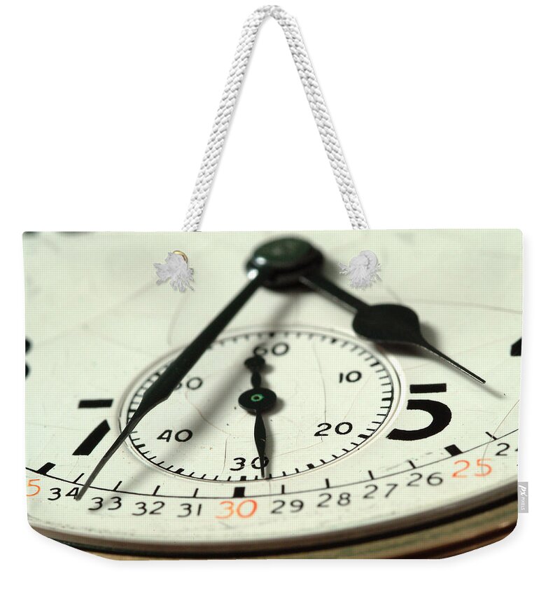 Watch Weekender Tote Bag featuring the photograph Captured Time by Michael McGowan