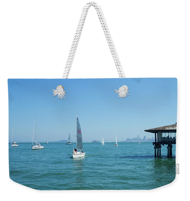 Carefree Sunday Weekender Tote Bag featuring the photograph Carefree Sunday by Bonnie Follett