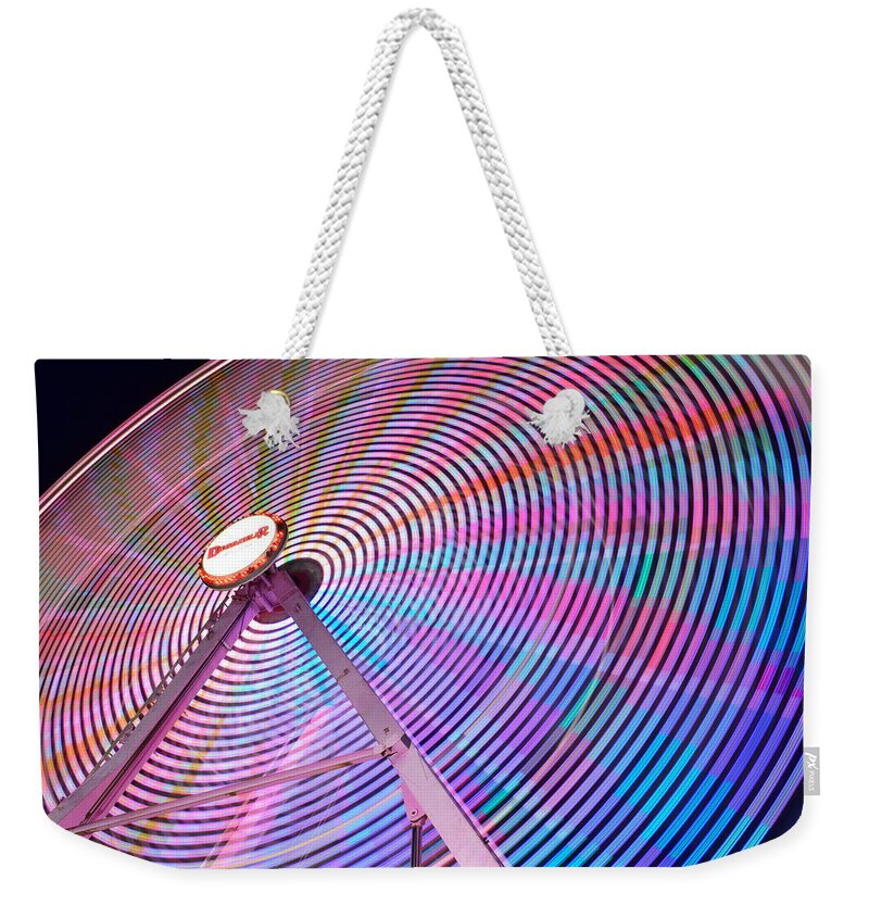 Carnival Weekender Tote Bag featuring the photograph Carnival Spectacle by Nicole Lloyd