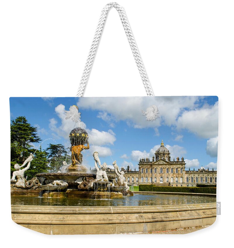 Castle Howard Weekender Tote Bag featuring the photograph Castle Howard and Atlas Fountain by Shanna Hyatt
