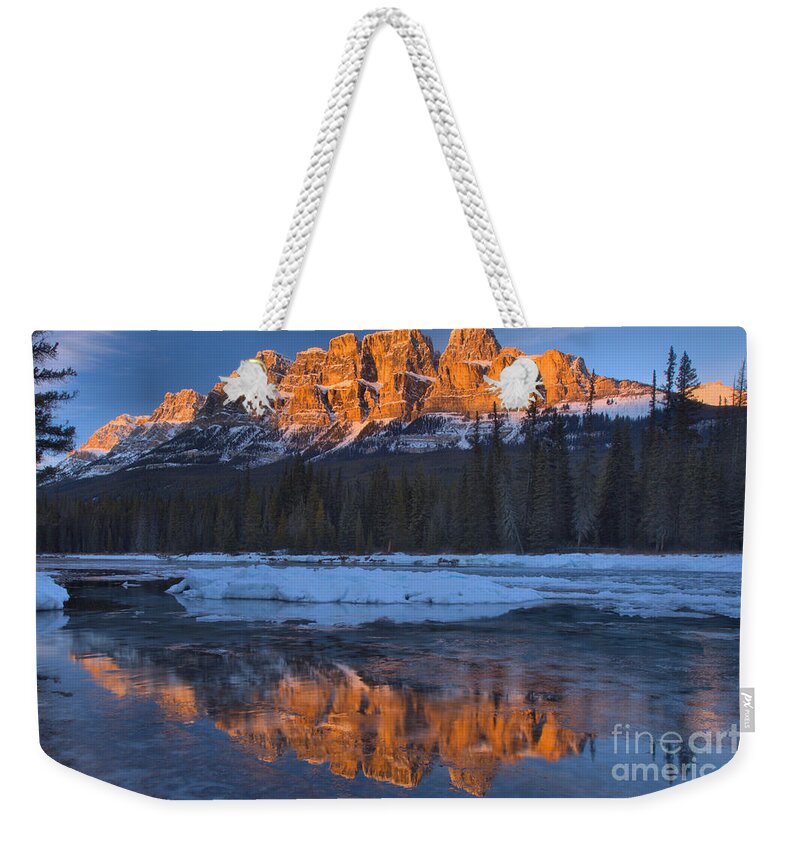 Castle Mountain Weekender Tote Bag featuring the photograph Castle Mountain Red Winter Reflections by Adam Jewell