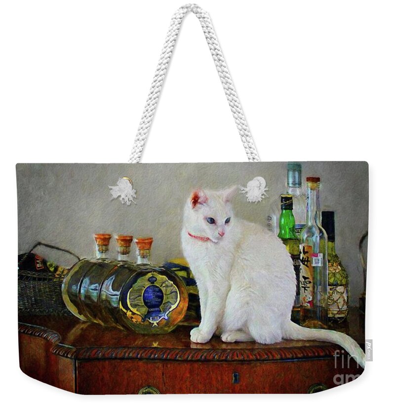 John+kolenberg Weekender Tote Bag featuring the photograph Cat On The Liquor Cabinet by John Kolenberg